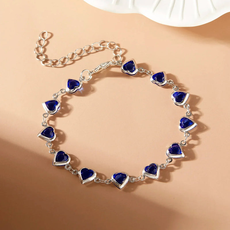 Pulseira Elegante com Cristal Vermelho — Um Toque de Paixão e Sofisticação em Cada Movimento